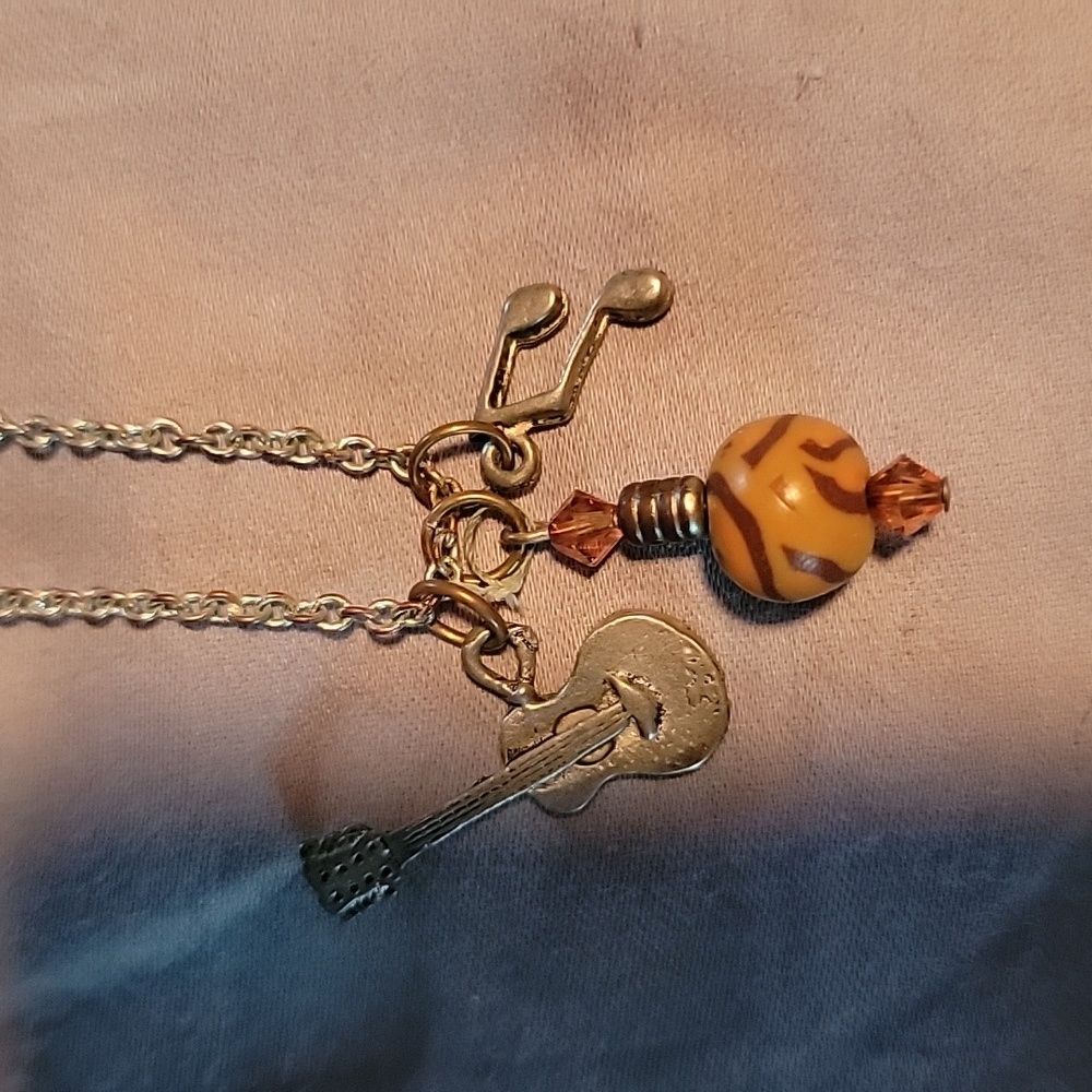Guitar and musical note necklace